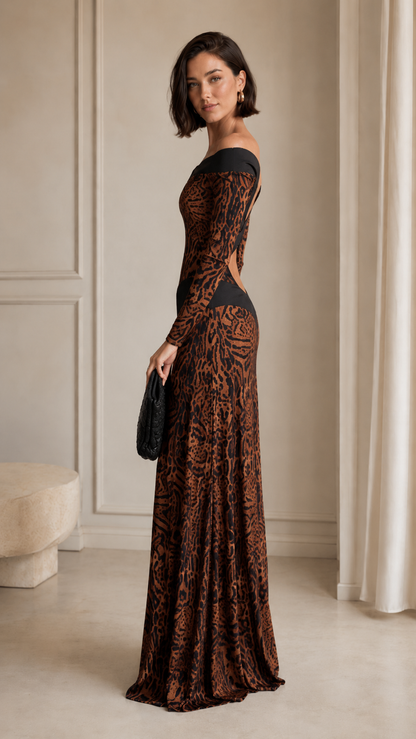 Side view of brown long-sleeve off-shoulder floor-length gown with fitted silhouette