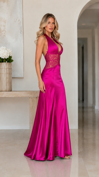 Side view of fuchsia halter maxi gown with plunging neckline and lace waist detail