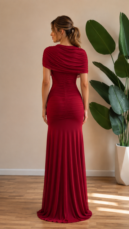 Back view of burgundy fitted ruched floor-length gown