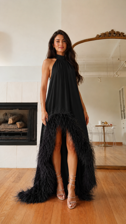 Black halter high-low maxi dress with feather trim front view
